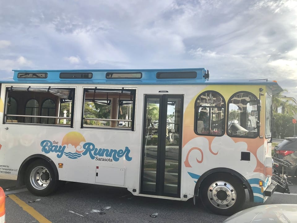 Bay Runner free Trolley. Take it to Main St, St Armands & Lido Key. Get the ap