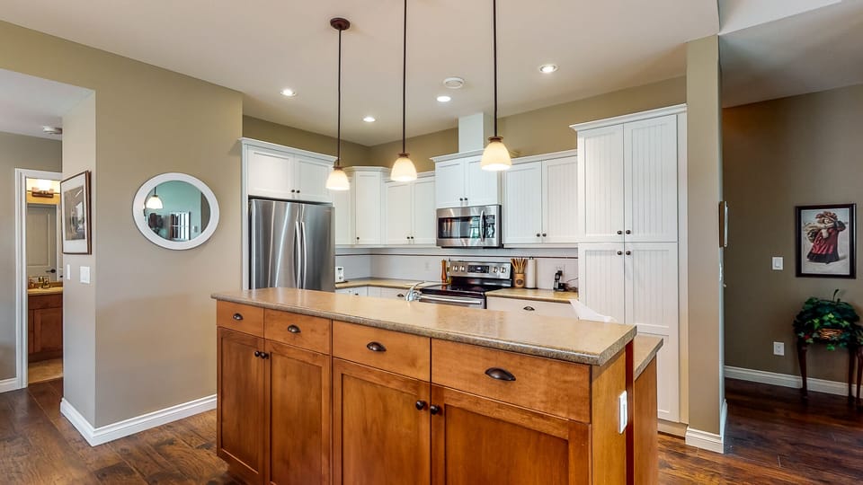 Our kitchen is stocked with dishes and cooking utensils included kids dishes.