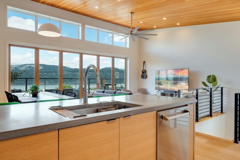 Kitchen looking South at living / dining room, and patio