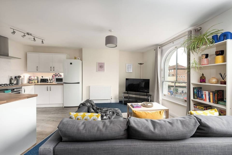 Living Room: Bright and airy space with quirky decor, perfect for relaxation and fun gatherings!