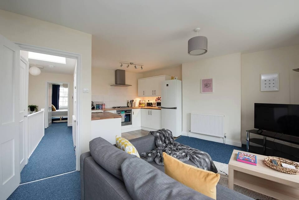 Open-Plan Living Room: Bright space with stylish decor, perfect for relaxing or entertaining!