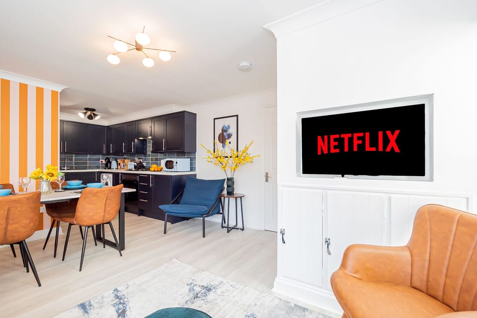 Step into your luxurious, open plan living room and kitchen area 