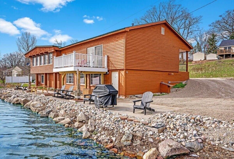 Grill available for guests to use, steps from the water