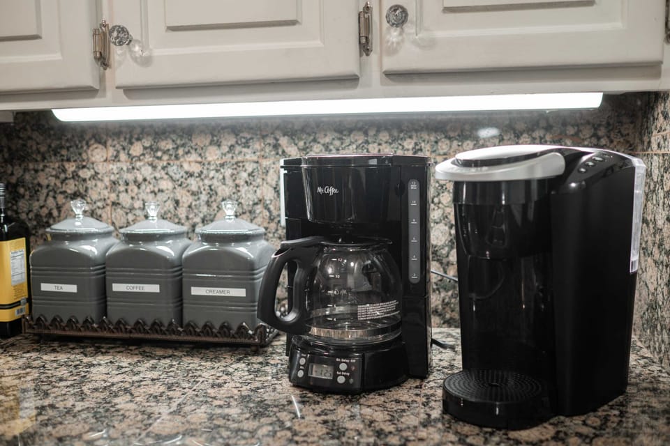 Coffee pot and Keurig. We provide complimentary ground coffee and kcups.
