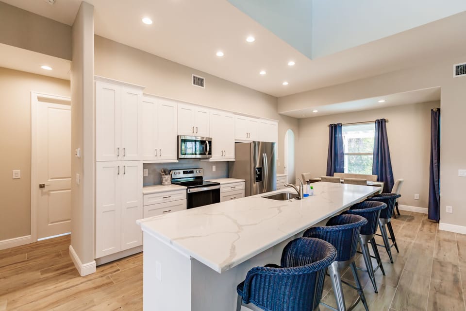 Two pantries, stainless appliances, and extremely well stocked kitchen 