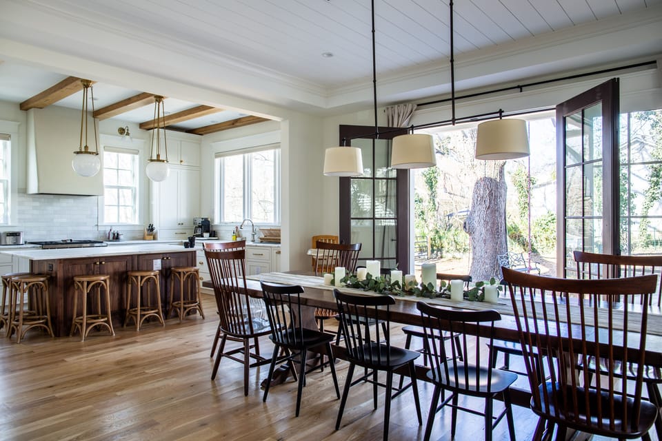 The dining room table expands to seat 14 adults comfortably.
