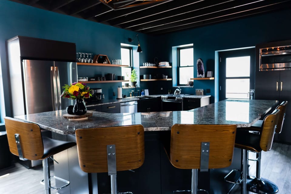Kitchen seating for five overlooking the living room