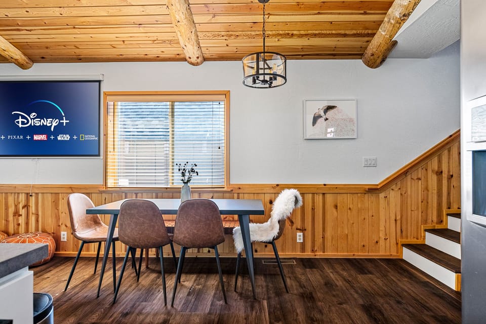 Dining table conveniently by the kitchen and living room