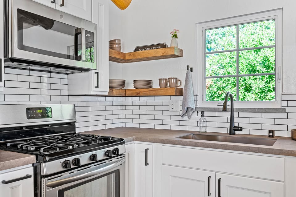 Open shelf concept provides ease for grabbing and storing dishes. 