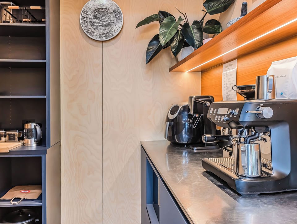 Breville coffee machine with the beast Byron Bay roasted Coffee Beens. 