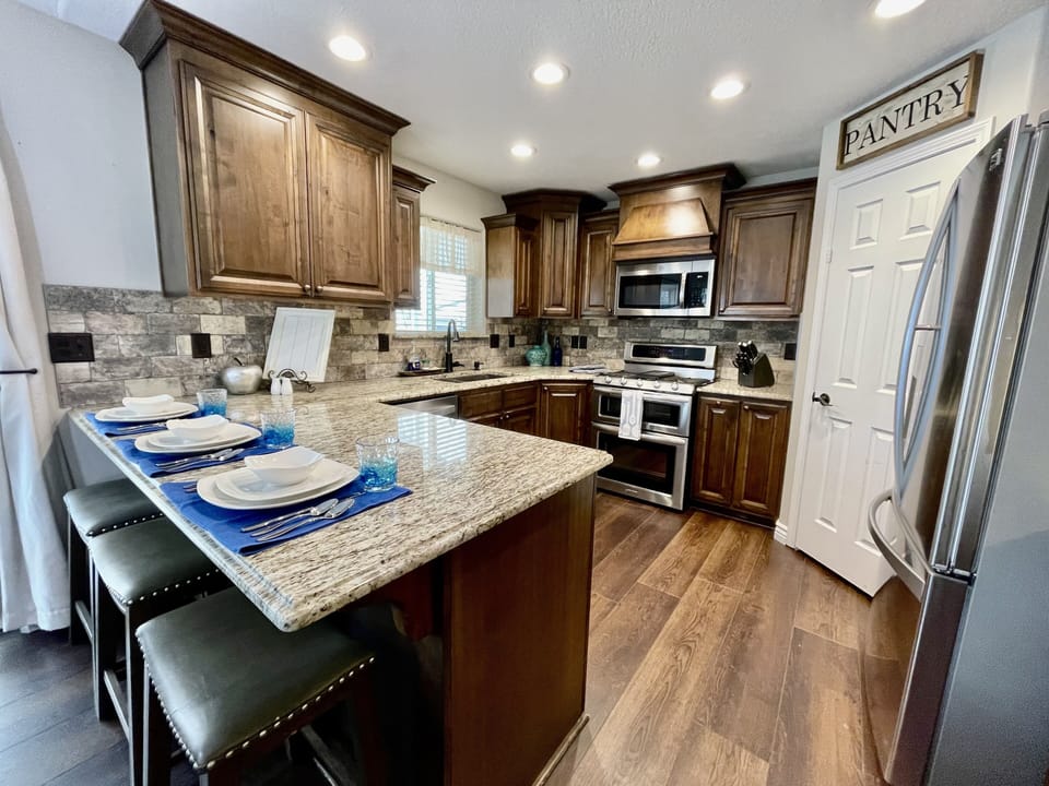 Kitchen, walk-in pantry and full appliances, dishes, pots and pans.
