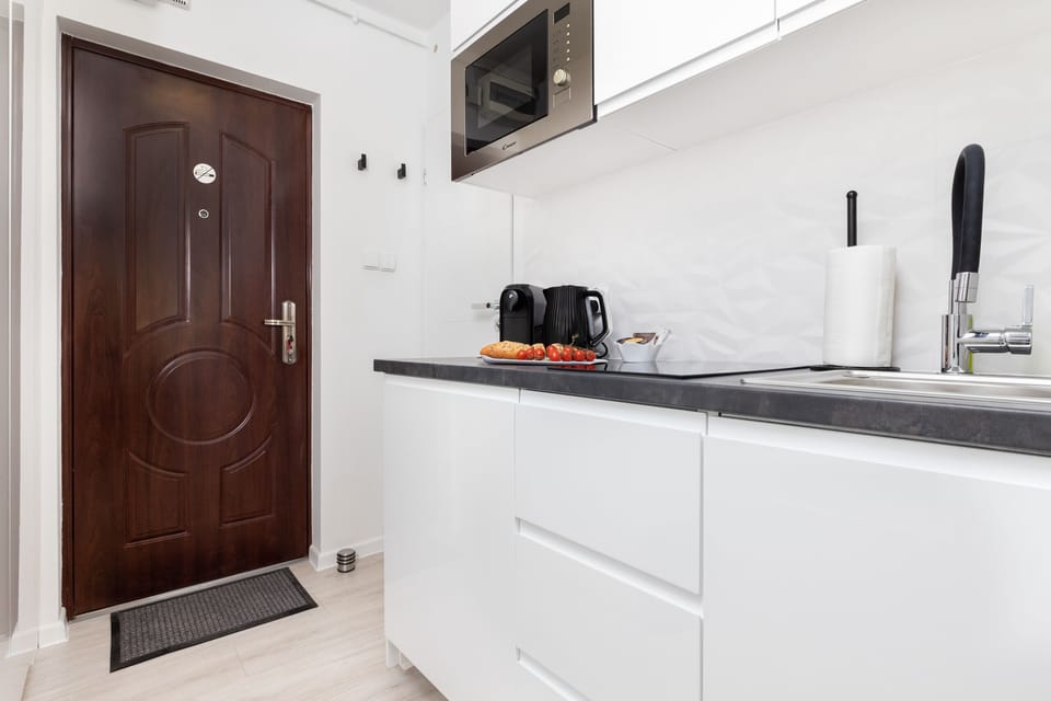 A functional kitchenette that provides a comfortable space for preparing your favourite meals.