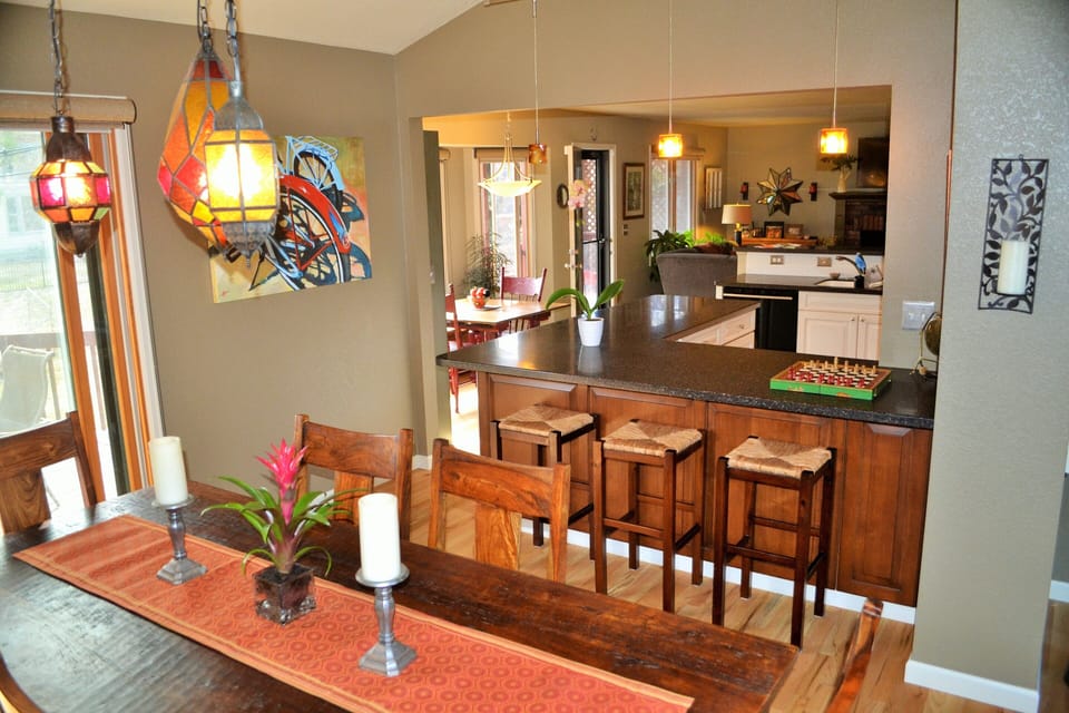 Dining table sits up to 10 people and is open to the kitchen with overflow seati