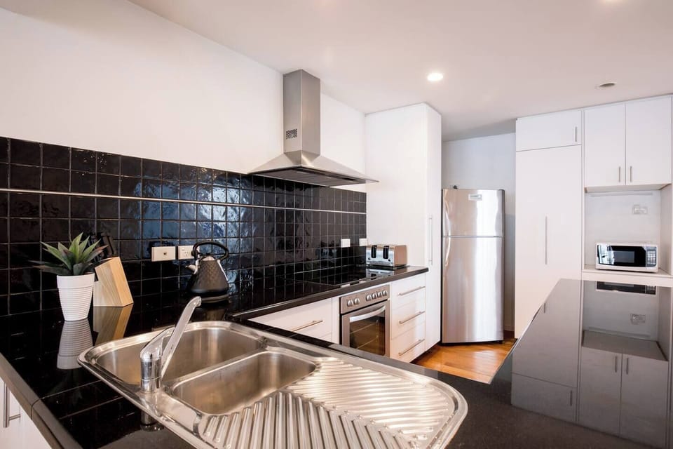 The kitchen comes well equipped for your holiday catering with ample storage space to stock up on groceries. 