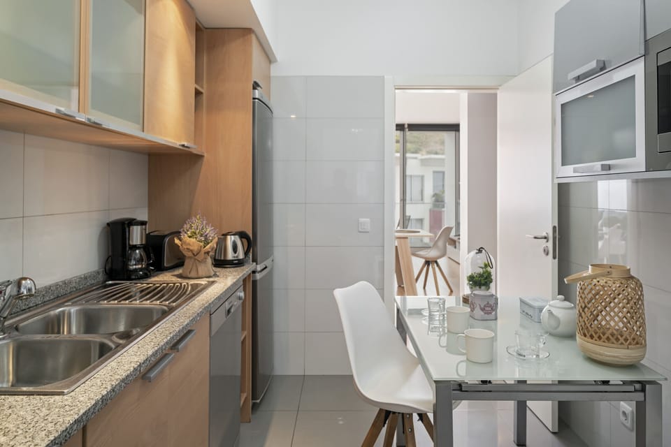 Kitchen with more than enough storage and space to support your recipes or even for small meals.