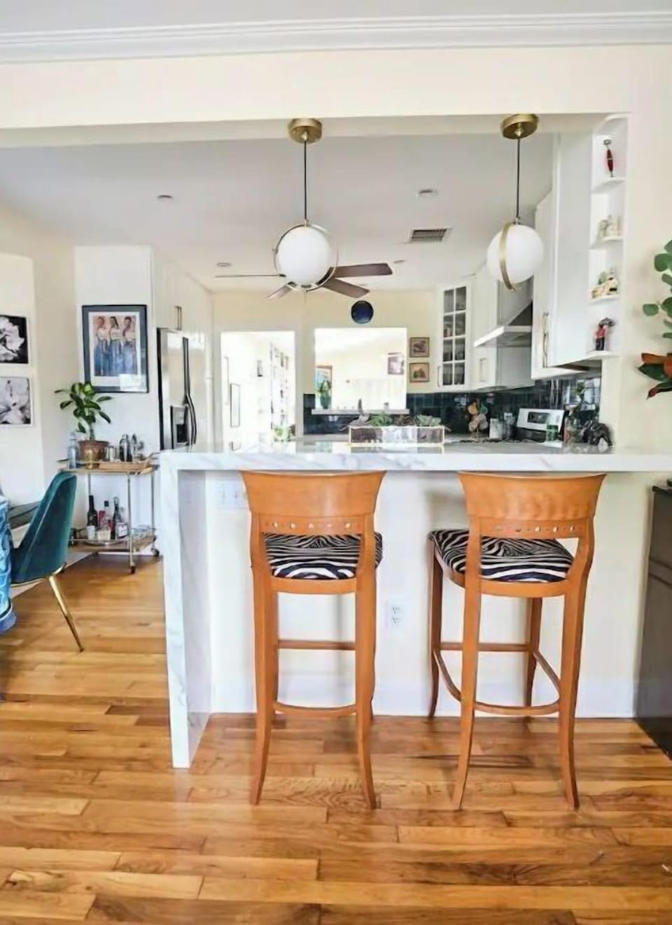 Kitchen bar (off of Living Room Salon) which seats two. 