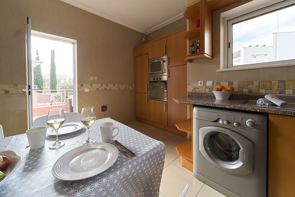 Kitchen with covered kitchen table