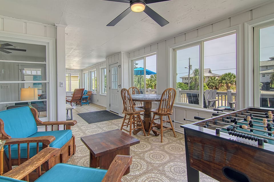 Game room side with foosball table & sitting for readers/spectators 