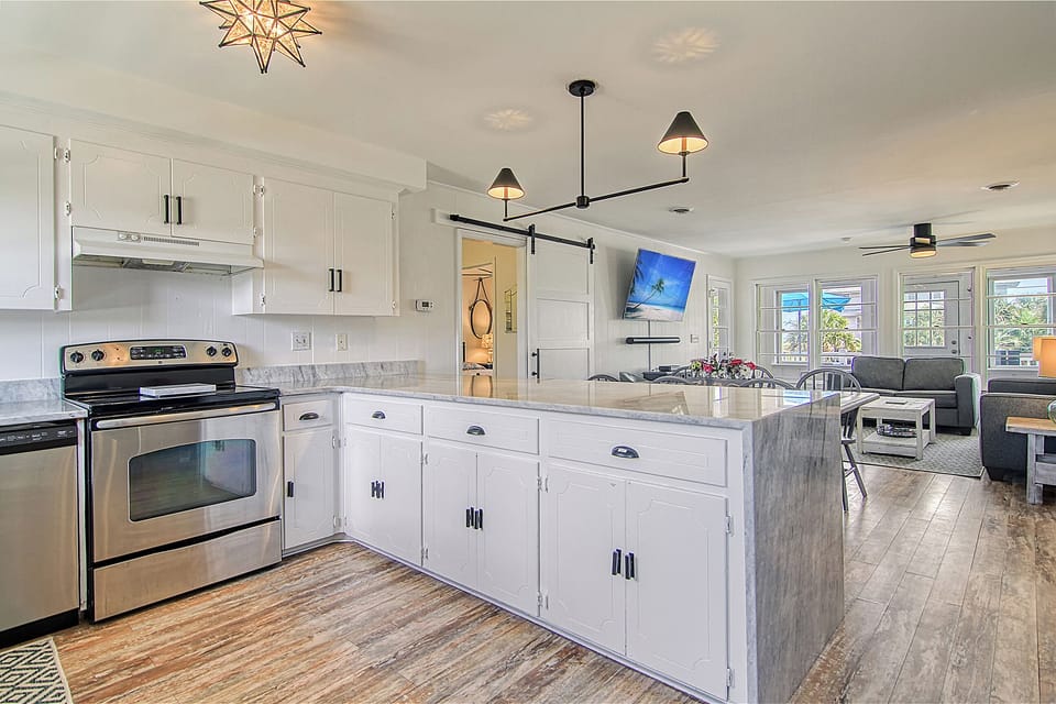 View from kitchen entry door through to dining & living