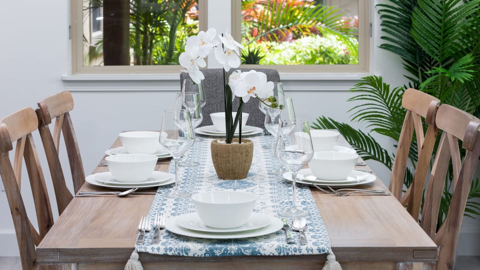 Lovely dinnerware, linens and flatware provided