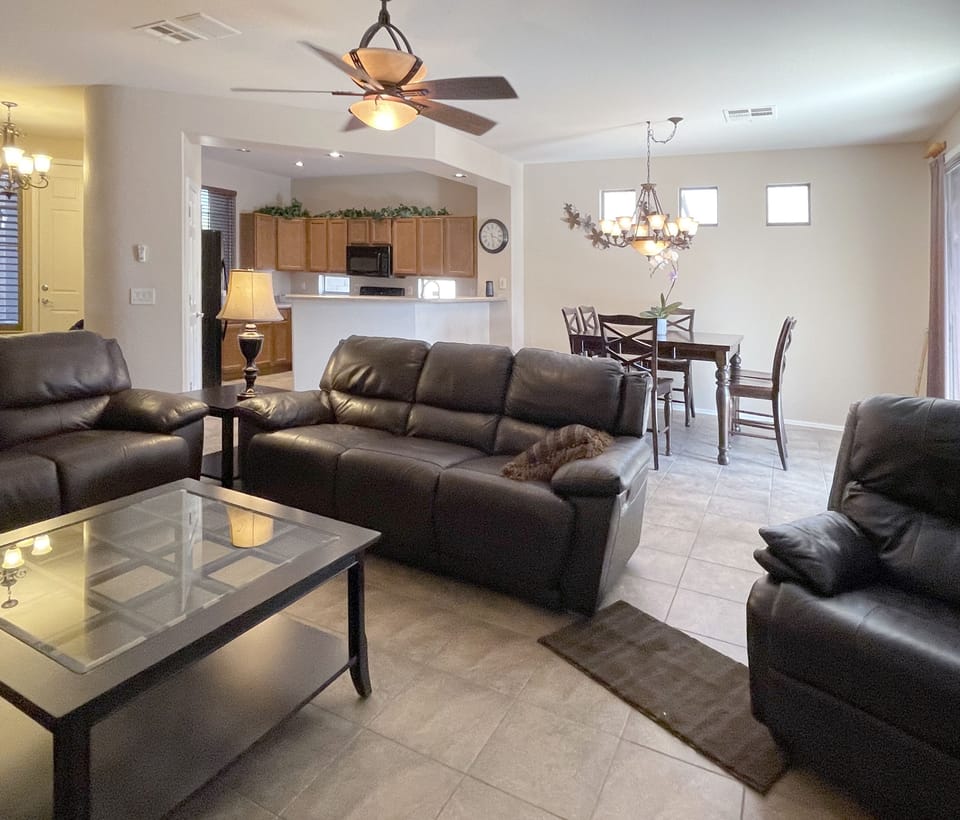The open floor plan includes a family room, kitchen and eating area