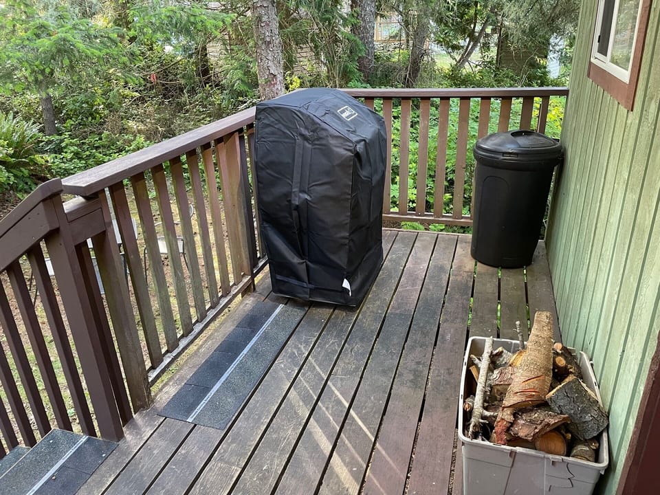 BBQ and extra wood can be found on the back deck.