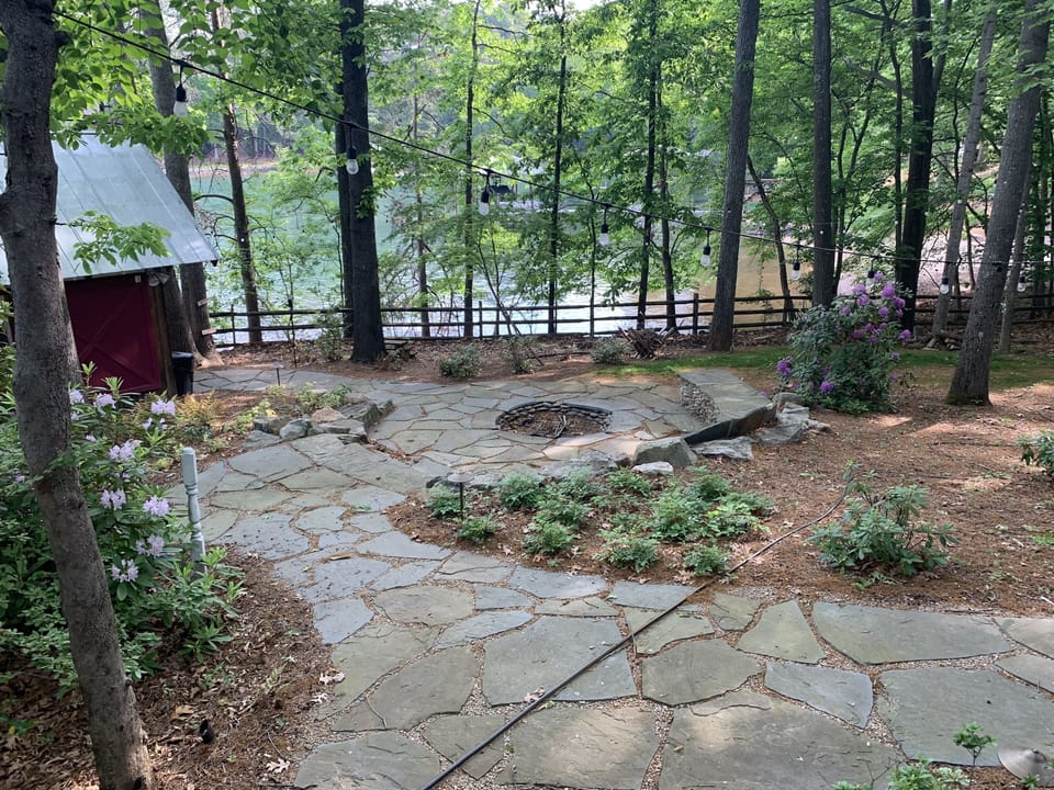 Huge fire pit with plenty of built in seats.