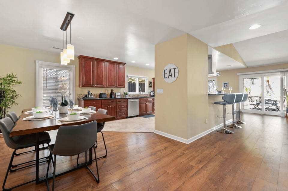 Between the dining table and kitchen island, everyone has a seat

