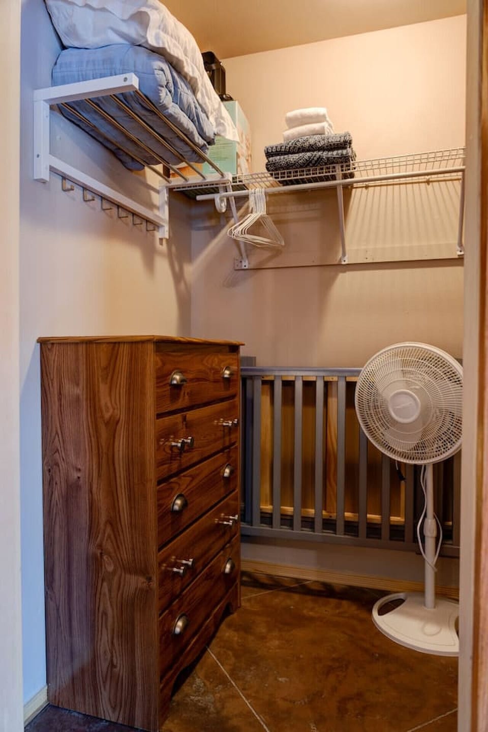 Walk-in closet with dresser, hangers, extra sheets and a blanket, hand-held vacuum, broom, iron and ironing board, fan, space heater, and personal swamp cooler for those hot days! Bringing a baby? Ask about our portable crib.