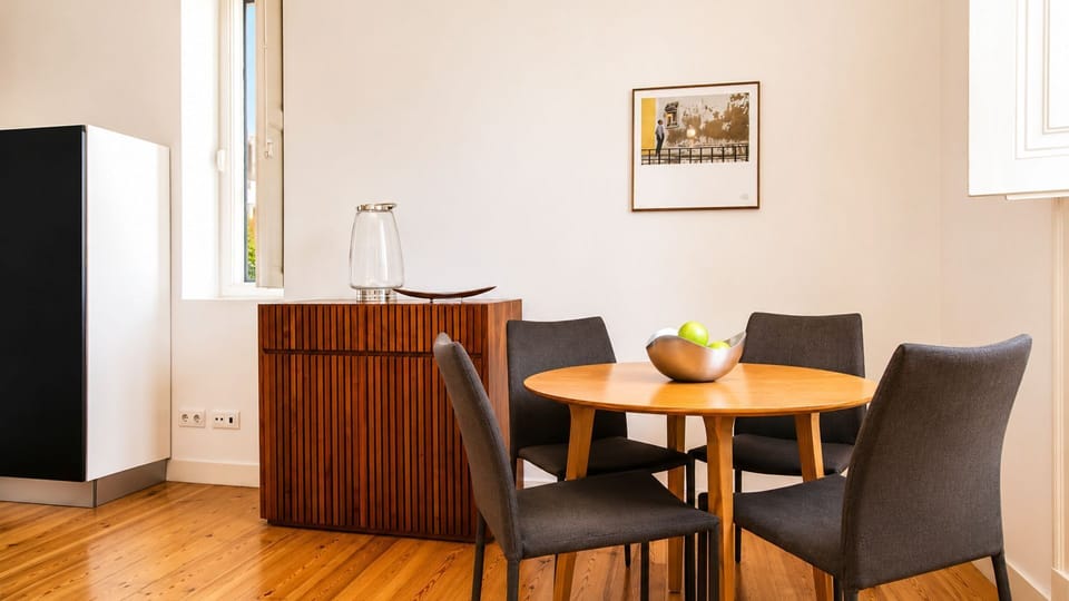 Imagine sharing a delicious meal or planning your day at this inviting dining space, bathed in natural light, perfect for intimate conversations or a relaxed breakfast. This bright area combines functionality with a cozy atmosphere, making every meal a pl