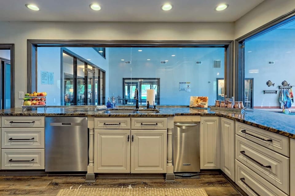 Kitchen looking into pool area. 
