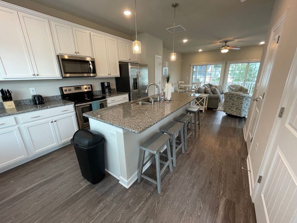 large kitchen with bar seating