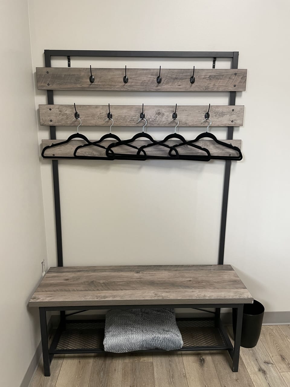 There is a place to hang clothes like this in every room. 