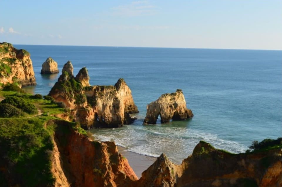 Rock arch on the beach in Alvor