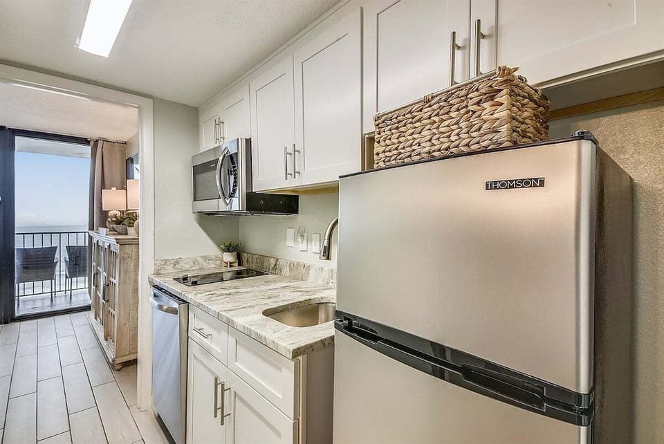The kitchen is arranged for simple meals and easy mornings during your stay.