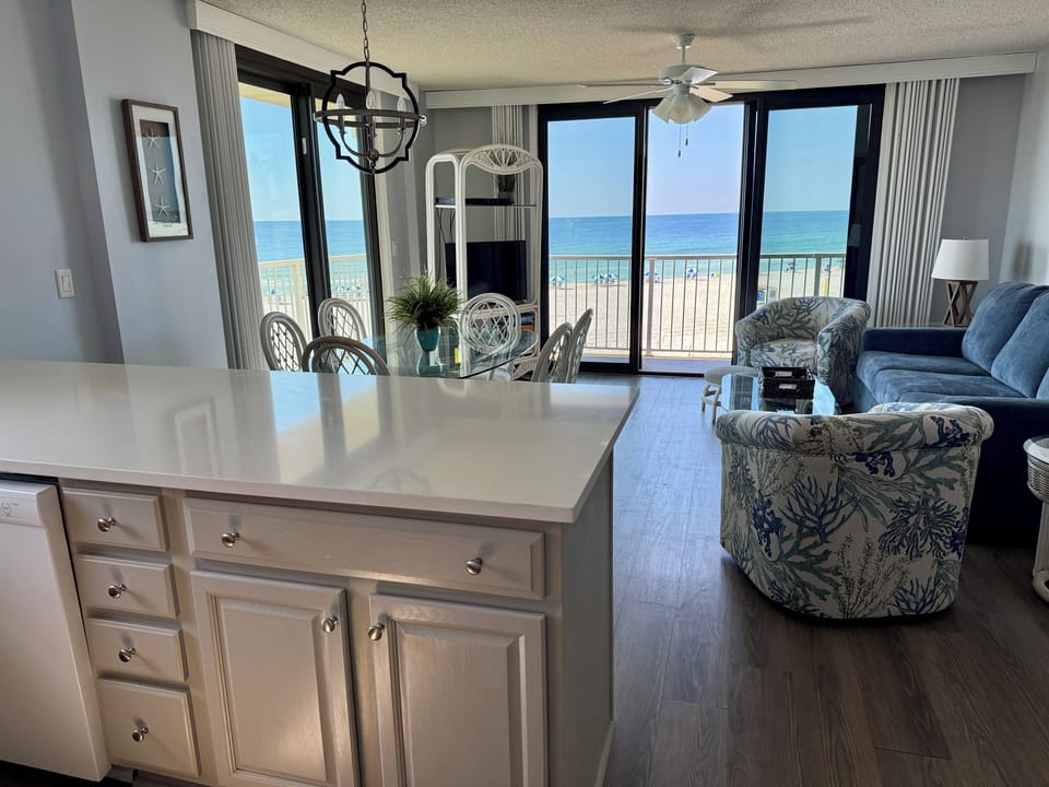 Quartz countertops with bar into living room