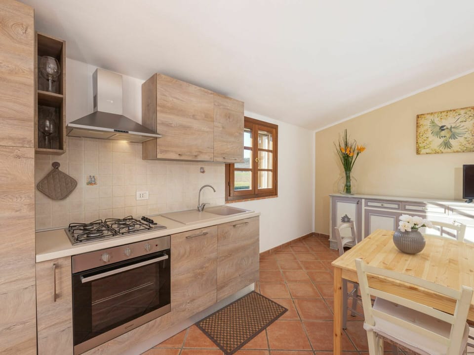 Cabinetry, Property, Furniture, Countertop, Table, Wood, Kitchen Appliance, Kitchen Stove, Kitchen, Flooring