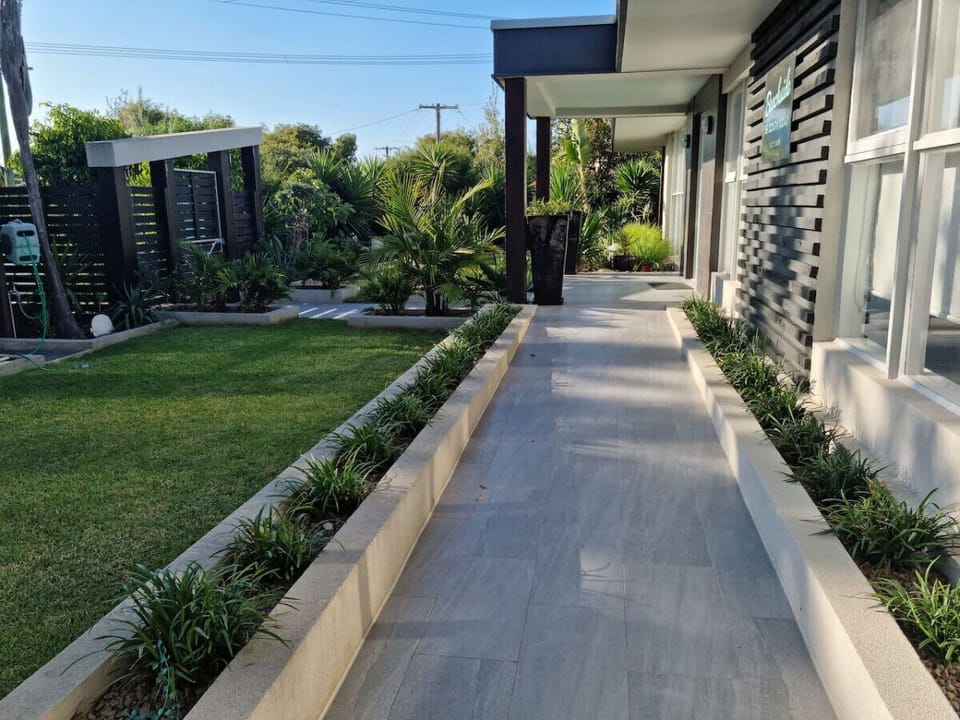 Wheelchair access ramp from the garage to the front entrance door. All internal doorways are 89cm wide.