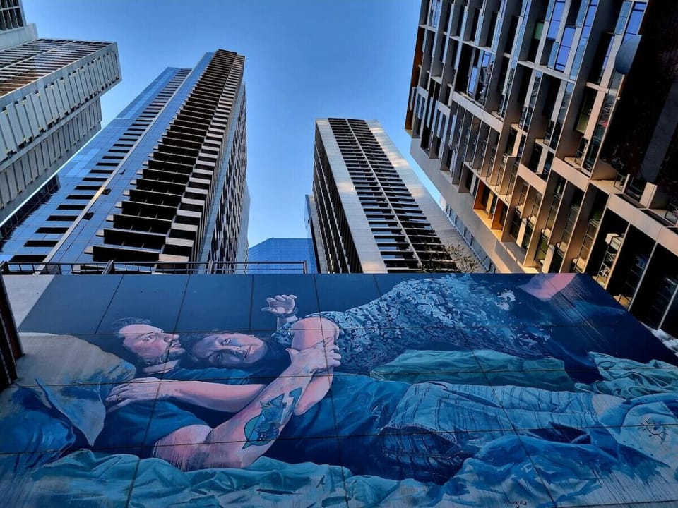 A 6 story high mural adorns the wall of our apartment complex.