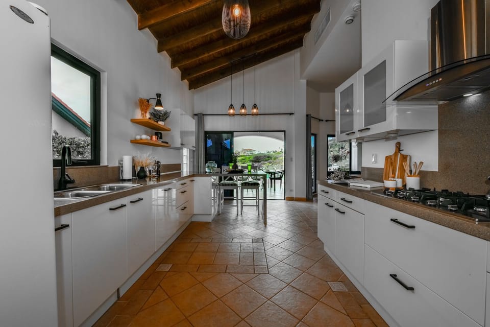 Discover the heart of our home: a large open concept kitchen that combines style, functionality, and comfort.