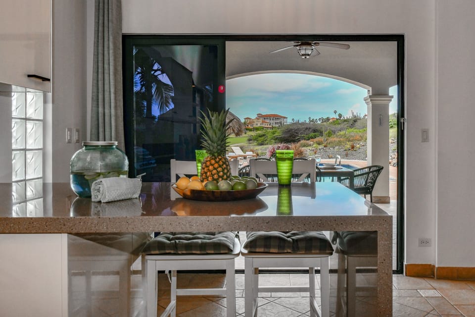 Entertain effortlessly in our open concept kitchen, offering direct access to the patio for al fresco dining.
