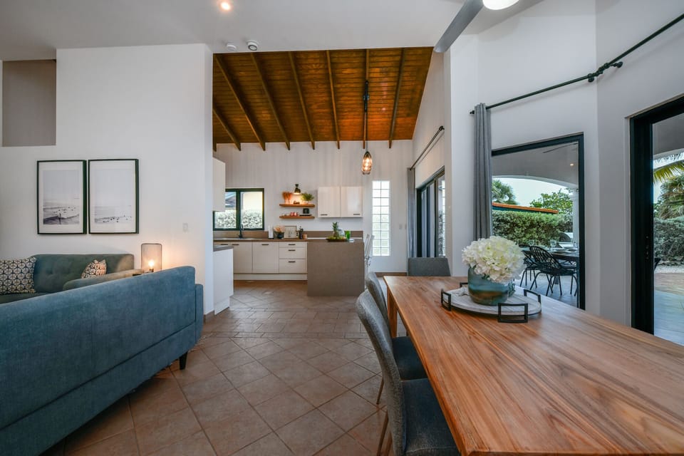 The spacious open-concept living and dining area creates a perfect setting for both everyday living and entertaining.