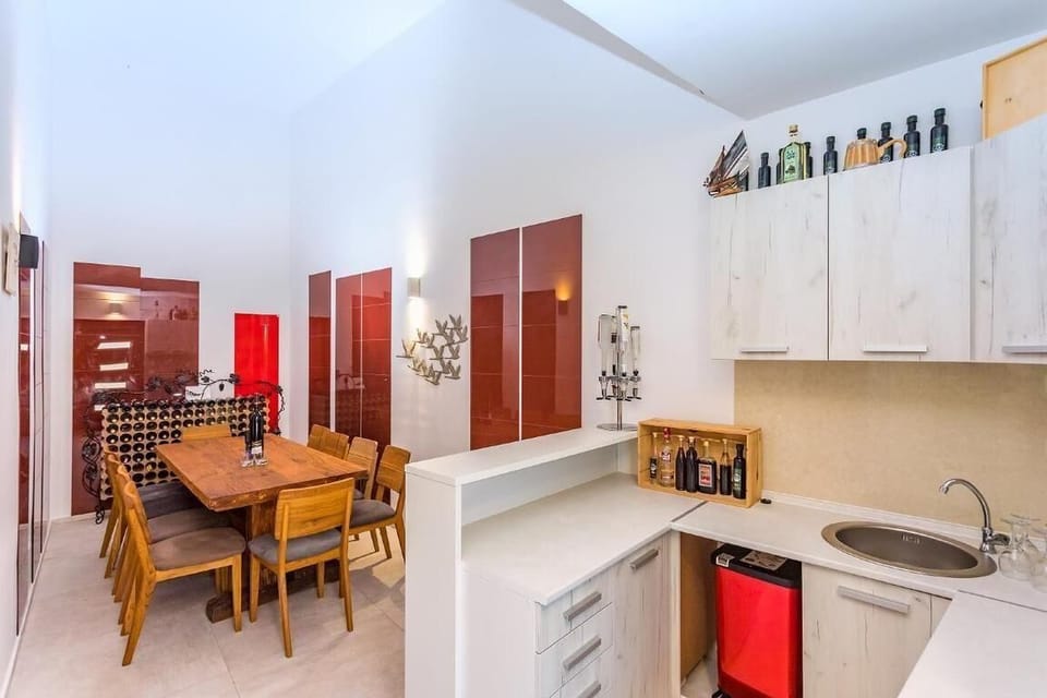 Dining area. Another indoor dining area for 12 people with an electric barbecue