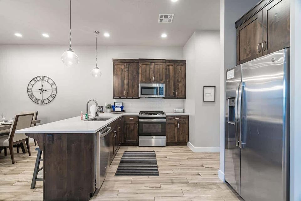 Beautiful open concept kitchen with bar and deluxe appliances