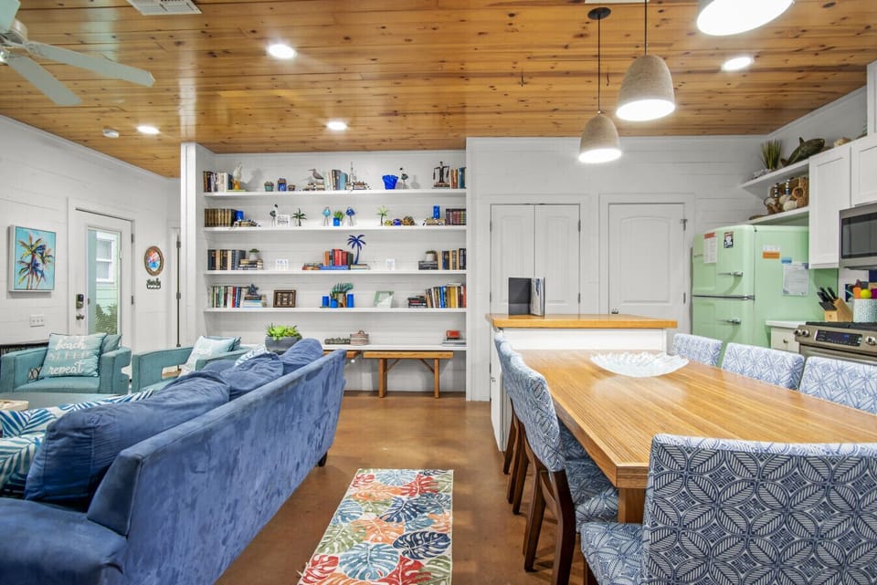Dining area and living room combination with seating for the whole family.
