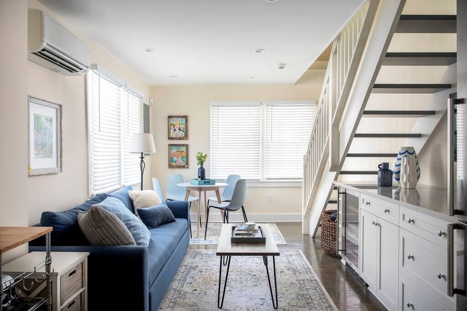 Stylish furnishings. This sofa converts to a queen bed for two additional guests. 
