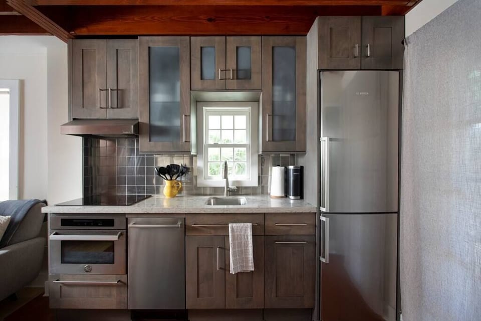 Everything you need is in this kitchen. Enjoy a cup or coffee or make a dinner with the great Wolf and Bosch appliances. 