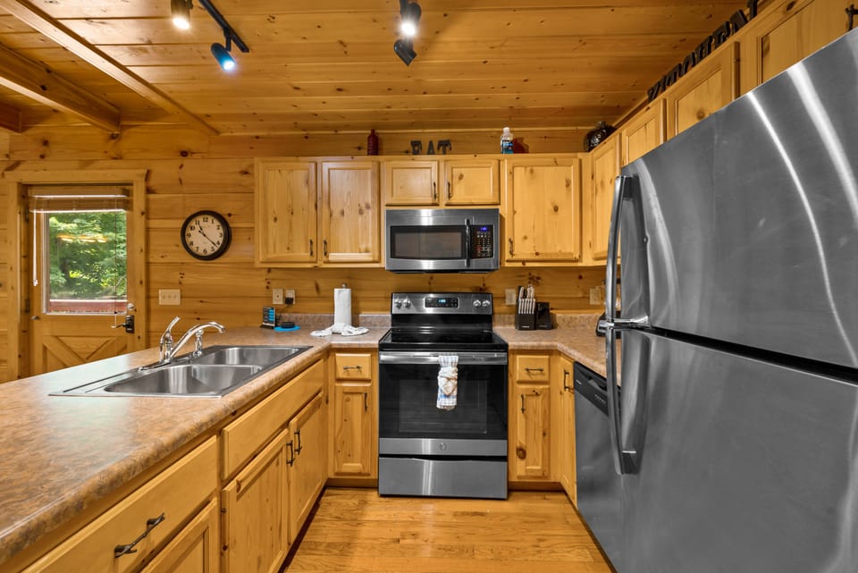 Kitchen with utensils, cookware, bakeware, dinnerware, & more