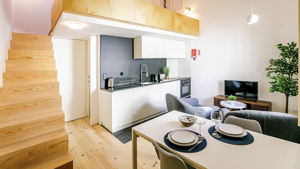 Where functionality meets warm design — the perfect blend of clean lines and cosy vibes.

#LovelyStay #ModernLiving #WoodDetails #PortoRental