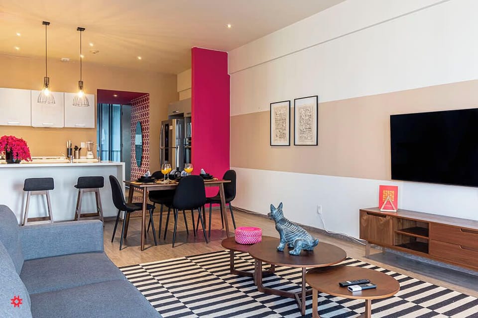 The building contains several similar units, Furniture, decor, and amenities may vary